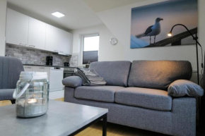 Ferienwohnungen Meerfarbig Zingst mit Terrasse oder Balkon Parkplatz WLAN ruhig und zentral